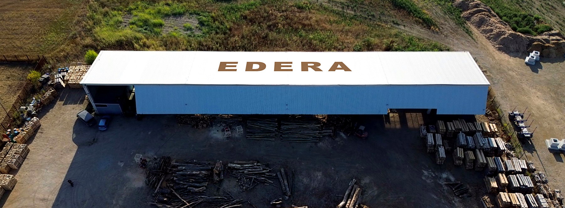 Aerial view of the EDERA sawmill in Ribnik with the company name on the roof